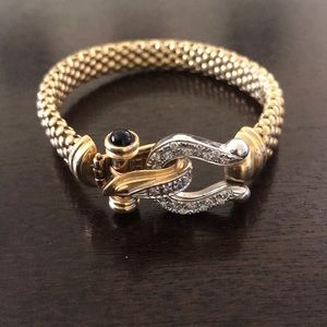 14 karat gold bracelet with diamond accents